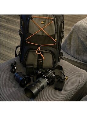 Nikon Black D80 DSLR Camera with Zoom Lens and Gray/Black Camera Backpack